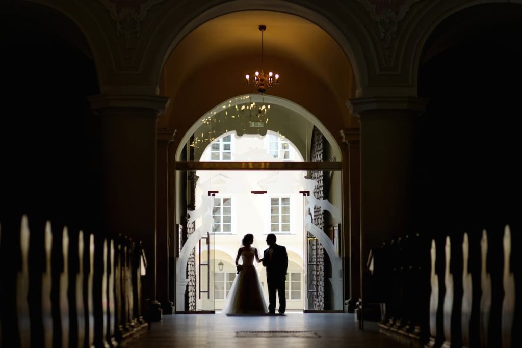 Father Daughter at a wedding in silhouette background