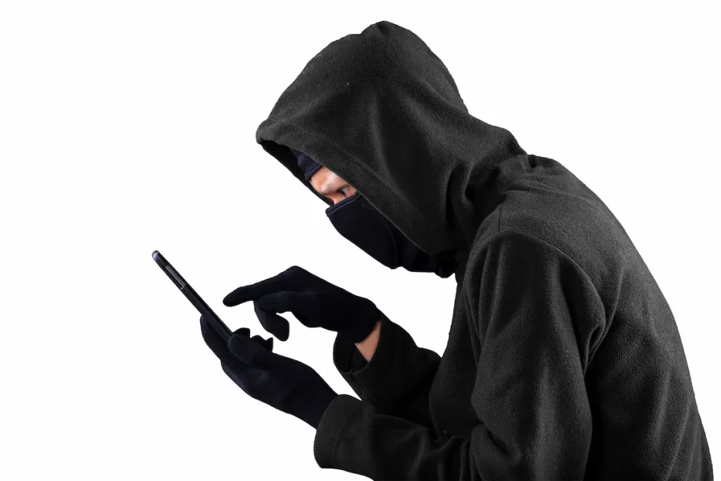 Hacker trying to break password on phone