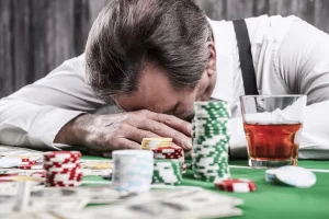 gambling man passed out on poker table
