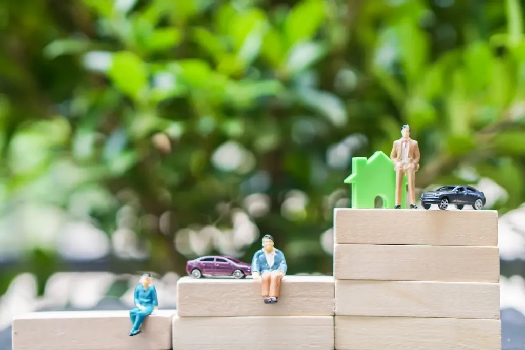 Toy figurines symbolizing stages of Socioeconomic Status