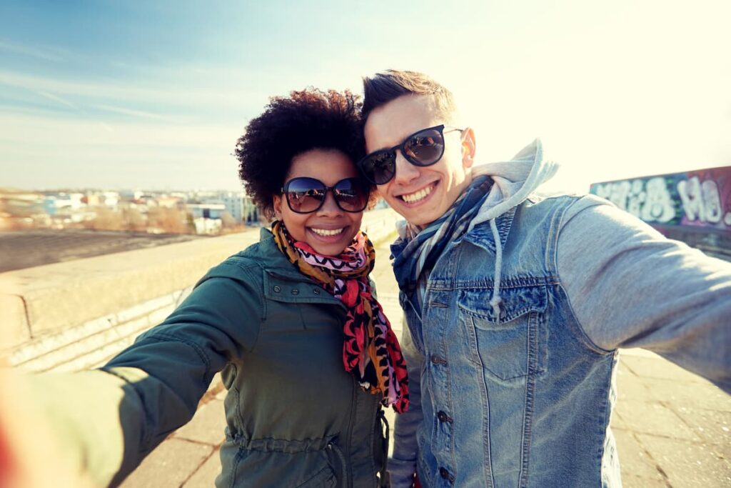 Girlfriend and boyfriend travel selfie up close